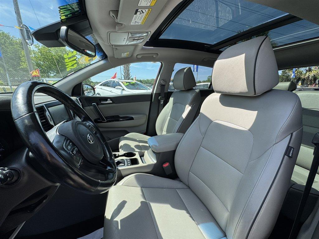 2019 Red /Grey Kia Sportage (KNDPNCAC7K7) with an 2.4l I-4 DI Dohc 2.4l engine, Automatic transmission, located at 745 East Steele Rd., West Columbia, SC, 29170, (803) 755-9148, 33.927212, -81.148483 - Photo#21