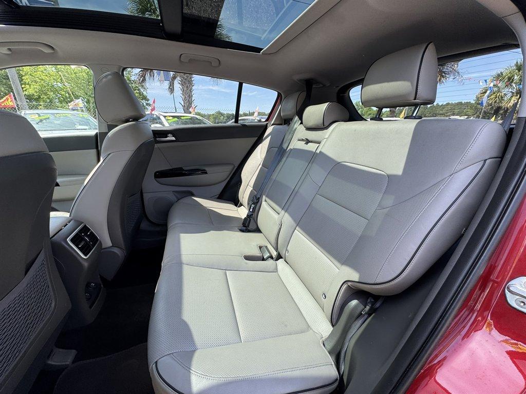 2019 Red /Grey Kia Sportage (KNDPNCAC7K7) with an 2.4l I-4 DI Dohc 2.4l engine, Automatic transmission, located at 745 East Steele Rd., West Columbia, SC, 29170, (803) 755-9148, 33.927212, -81.148483 - Photo#24