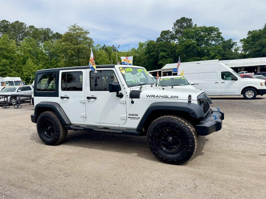 2015 White /Black Jeep Wrangler (1C4BJWKG2FL) with an 3.6l V6 MPI Dohc 3.6l engine, Automatic transmission, located at 745 East Steele Rd., West Columbia, SC, 29170, (803) 755-9148, 33.927212, -81.148483 - Photo#2