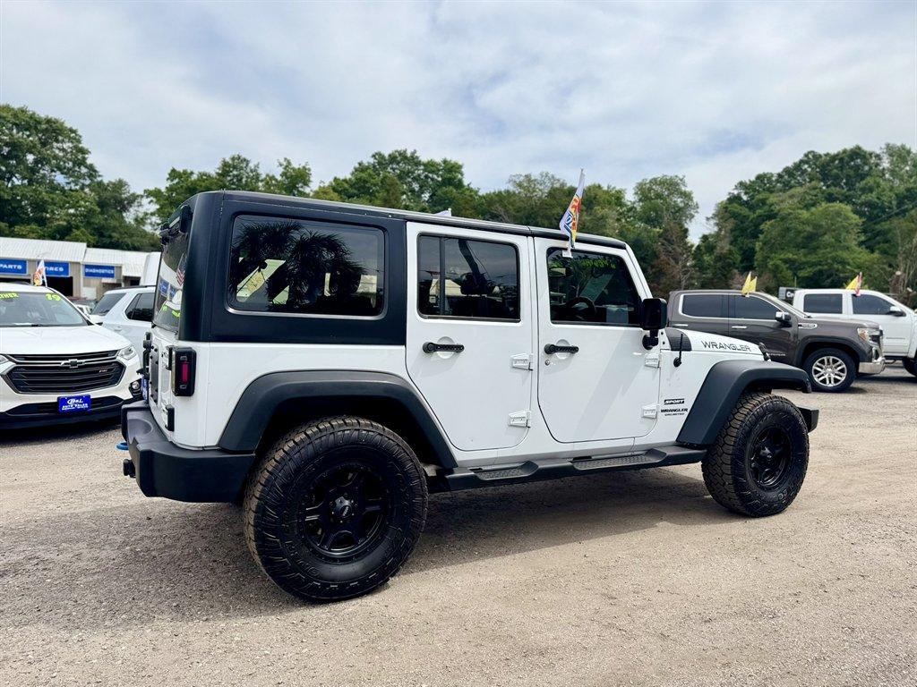 2015 White /Black Jeep Wrangler (1C4BJWKG2FL) with an 3.6l V6 MPI Dohc 3.6l engine, Automatic transmission, located at 745 East Steele Rd., West Columbia, SC, 29170, (803) 755-9148, 33.927212, -81.148483 - Photo#3