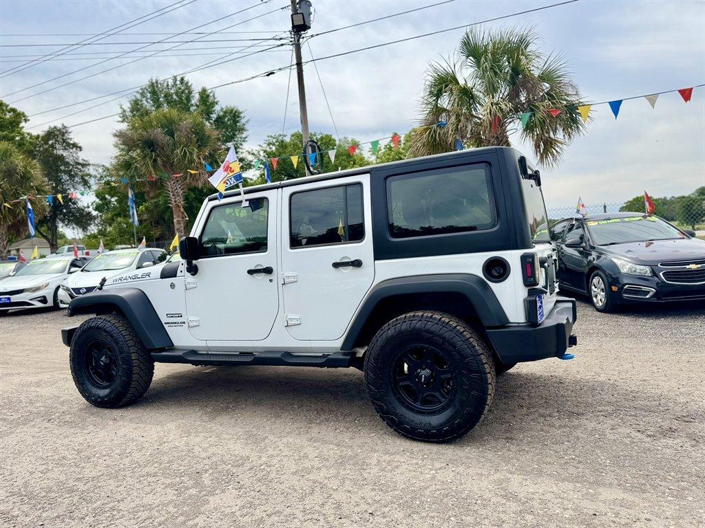2015 White /Black Jeep Wrangler (1C4BJWKG2FL) with an 3.6l V6 MPI Dohc 3.6l engine, Automatic transmission, located at 745 East Steele Rd., West Columbia, SC, 29170, (803) 755-9148, 33.927212, -81.148483 - Photo#5