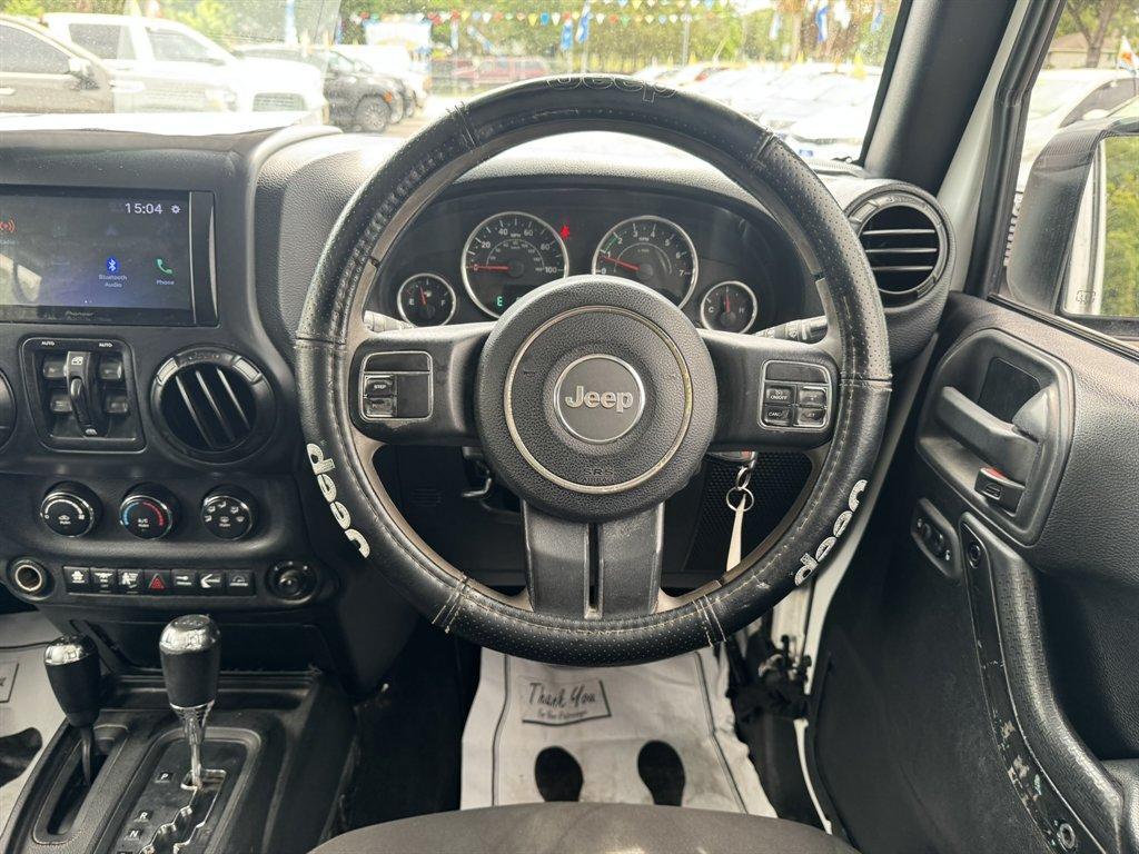2015 White /Black Jeep Wrangler (1C4BJWKG2FL) with an 3.6l V6 MPI Dohc 3.6l engine, Automatic transmission, located at 745 East Steele Rd., West Columbia, SC, 29170, (803) 755-9148, 33.927212, -81.148483 - Photo#7