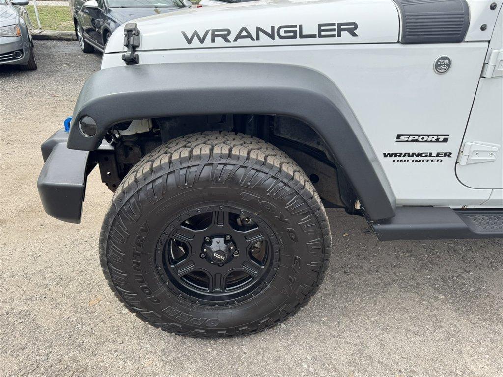 2015 White /Black Jeep Wrangler (1C4BJWKG2FL) with an 3.6l V6 MPI Dohc 3.6l engine, Automatic transmission, located at 745 East Steele Rd., West Columbia, SC, 29170, (803) 755-9148, 33.927212, -81.148483 - Photo#24