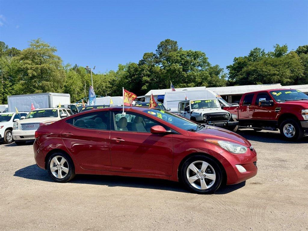 2013 Red /Taupe Hyundai Elantra (5NPDH4AE3DH) with an 1.8l I-4 MPI Dohc 1.8l engine, Automatic transmission, located at 745 East Steele Rd., West Columbia, SC, 29170, (803) 755-9148, 33.927212, -81.148483 - Photo#2