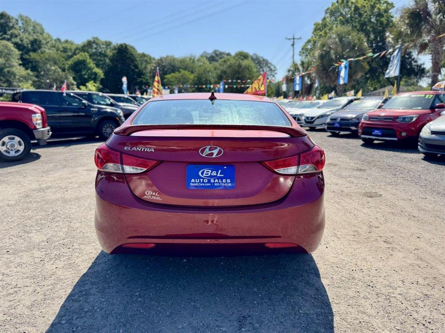 2013 Red /Taupe Hyundai Elantra (5NPDH4AE3DH) with an 1.8l I-4 MPI Dohc 1.8l engine, Automatic transmission, located at 745 East Steele Rd., West Columbia, SC, 29170, (803) 755-9148, 33.927212, -81.148483- Photo#4