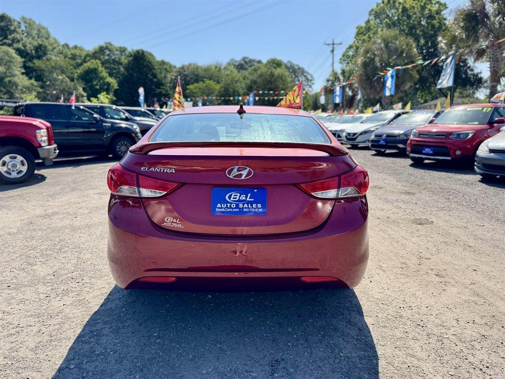 2013 Red /Taupe Hyundai Elantra (5NPDH4AE3DH) with an 1.8l I-4 MPI Dohc 1.8l engine, Automatic transmission, located at 745 East Steele Rd., West Columbia, SC, 29170, (803) 755-9148, 33.927212, -81.148483 - Photo#4