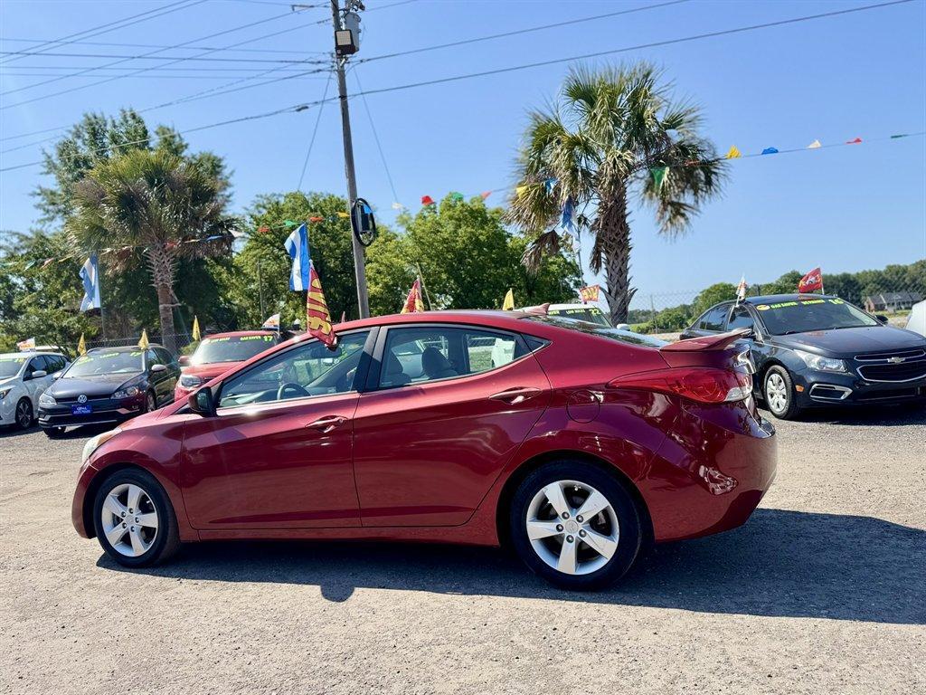 2013 Red /Taupe Hyundai Elantra (5NPDH4AE3DH) with an 1.8l I-4 MPI Dohc 1.8l engine, Automatic transmission, located at 745 East Steele Rd., West Columbia, SC, 29170, (803) 755-9148, 33.927212, -81.148483 - Photo#5