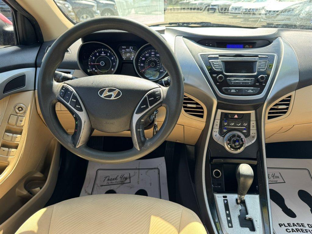 2013 Red /Taupe Hyundai Elantra (5NPDH4AE3DH) with an 1.8l I-4 MPI Dohc 1.8l engine, Automatic transmission, located at 745 East Steele Rd., West Columbia, SC, 29170, (803) 755-9148, 33.927212, -81.148483 - Photo#6
