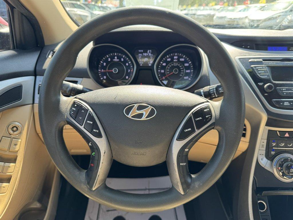 2013 Red /Taupe Hyundai Elantra (5NPDH4AE3DH) with an 1.8l I-4 MPI Dohc 1.8l engine, Automatic transmission, located at 745 East Steele Rd., West Columbia, SC, 29170, (803) 755-9148, 33.927212, -81.148483 - Photo#7