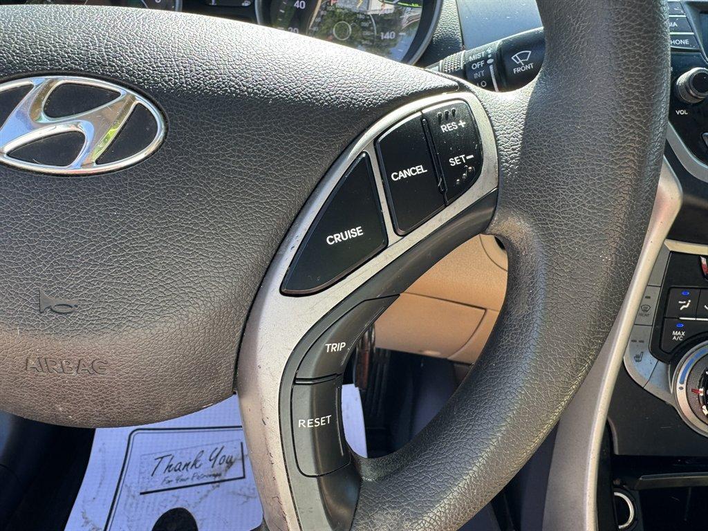 2013 Red /Taupe Hyundai Elantra (5NPDH4AE3DH) with an 1.8l I-4 MPI Dohc 1.8l engine, Automatic transmission, located at 745 East Steele Rd., West Columbia, SC, 29170, (803) 755-9148, 33.927212, -81.148483 - Photo#9