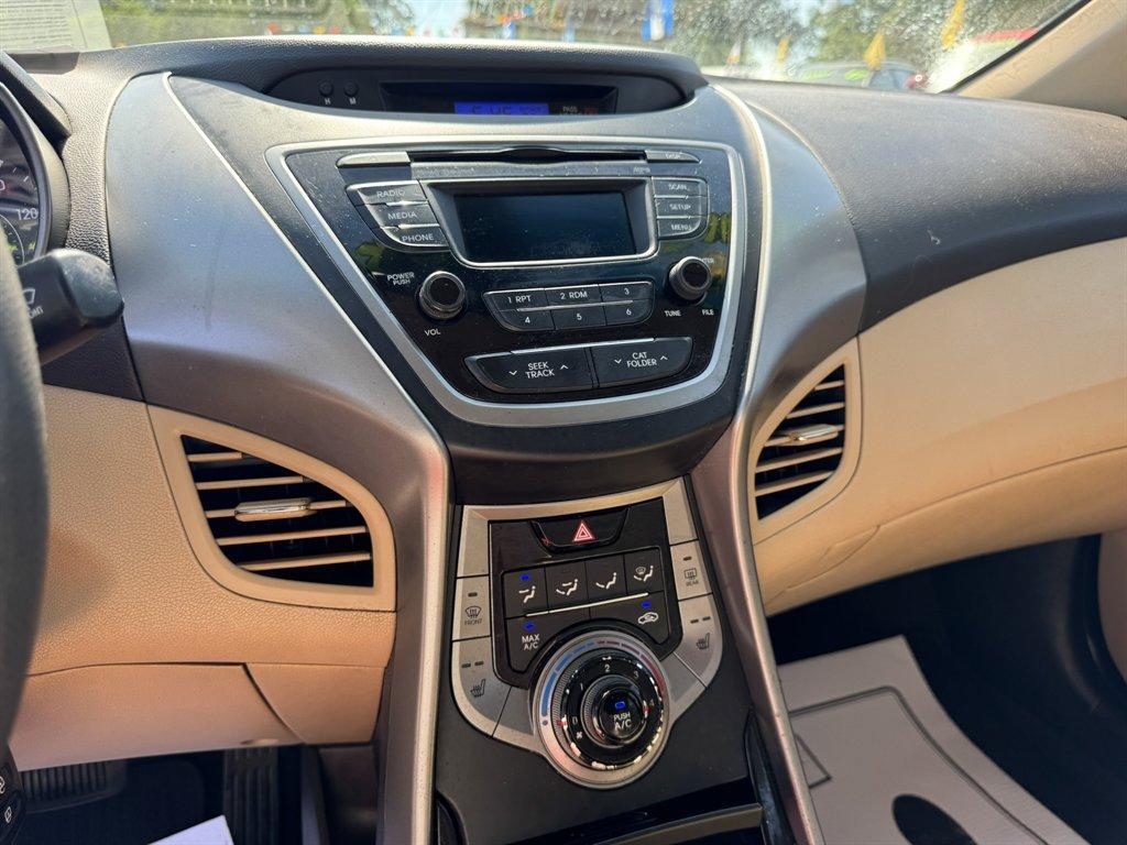2013 Red /Taupe Hyundai Elantra (5NPDH4AE3DH) with an 1.8l I-4 MPI Dohc 1.8l engine, Automatic transmission, located at 745 East Steele Rd., West Columbia, SC, 29170, (803) 755-9148, 33.927212, -81.148483 - Photo#12