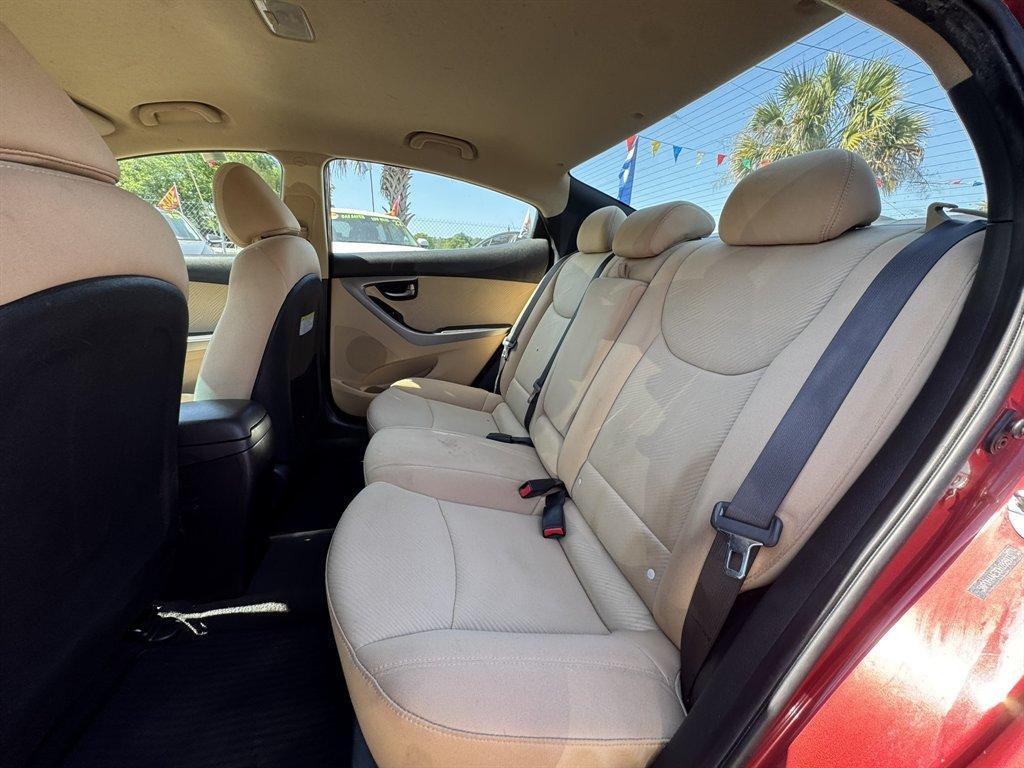 2013 Red /Taupe Hyundai Elantra (5NPDH4AE3DH) with an 1.8l I-4 MPI Dohc 1.8l engine, Automatic transmission, located at 745 East Steele Rd., West Columbia, SC, 29170, (803) 755-9148, 33.927212, -81.148483 - Photo#18