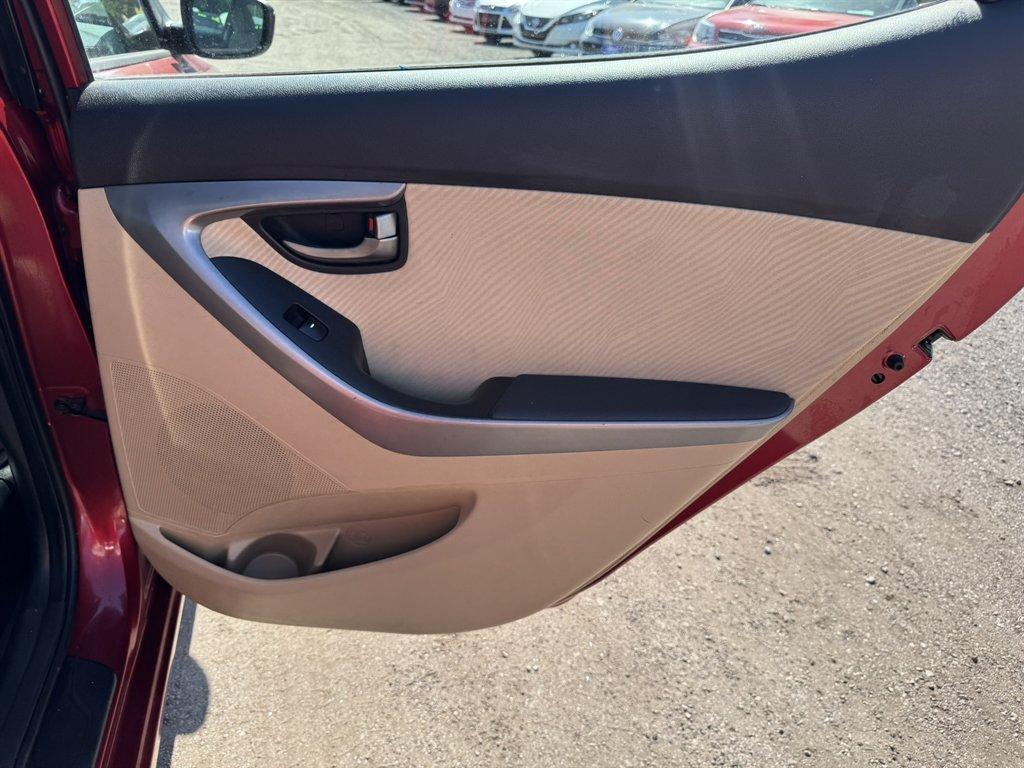 2013 Red /Taupe Hyundai Elantra (5NPDH4AE3DH) with an 1.8l I-4 MPI Dohc 1.8l engine, Automatic transmission, located at 745 East Steele Rd., West Columbia, SC, 29170, (803) 755-9148, 33.927212, -81.148483 - Photo#19