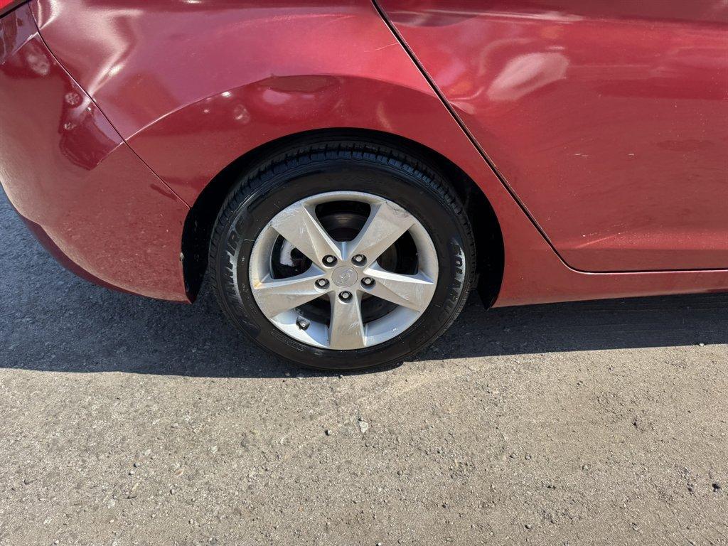 2013 Red /Taupe Hyundai Elantra (5NPDH4AE3DH) with an 1.8l I-4 MPI Dohc 1.8l engine, Automatic transmission, located at 745 East Steele Rd., West Columbia, SC, 29170, (803) 755-9148, 33.927212, -81.148483 - Photo#24
