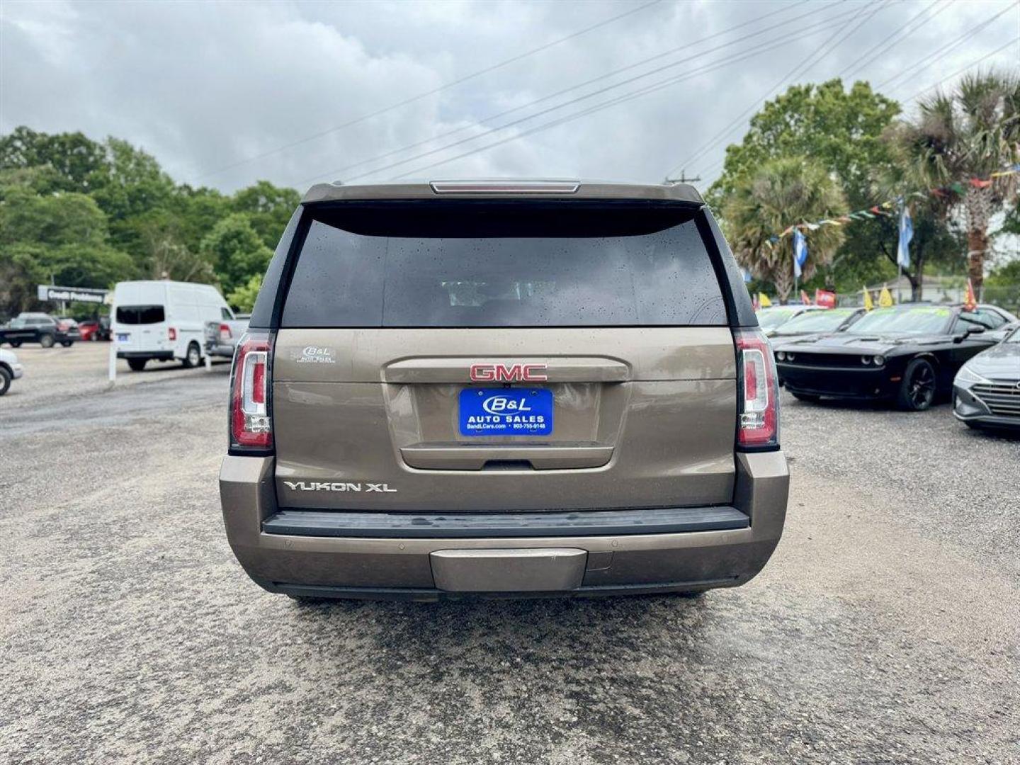 2016 Brown /Tan GMC Yukon XL (1GKS1GKC5GR) with an 5.3l V8 DI VVT Flex 5.3l engine, Automatic transmission, located at 745 East Steele Rd., West Columbia, SC, 29170, (803) 755-9148, 33.927212, -81.148483 - Photo#4