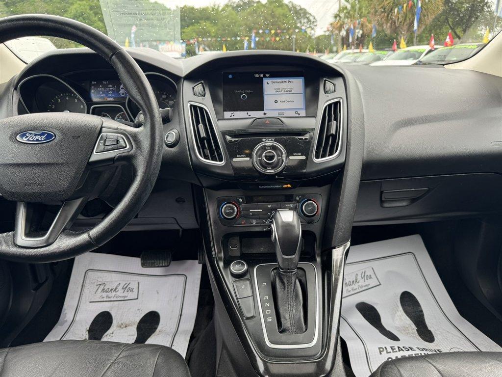 2016 Silver /Black Ford Focus (1FADP3J2XGL) with an 2.0l I-4 DI Dohc Flex 2.0 engine, Automatic transmission, located at 745 East Steele Rd., West Columbia, SC, 29170, (803) 755-9148, 33.927212, -81.148483 - Photo#11
