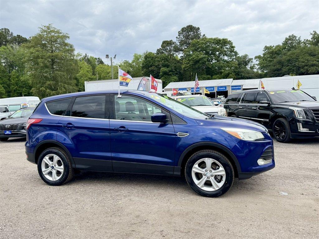 2013 Blue /Black Ford Escape (1FMCU0G97DU) with an 2.0l I-4 DI T/C Ecoboost engine, Automatic transmission, located at 745 East Steele Rd., West Columbia, SC, 29170, (803) 755-9148, 33.927212, -81.148483 - Photo#2