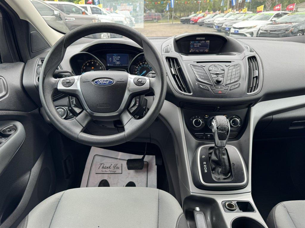 2013 Blue /Black Ford Escape (1FMCU0G97DU) with an 2.0l I-4 DI T/C Ecoboost engine, Automatic transmission, located at 745 East Steele Rd., West Columbia, SC, 29170, (803) 755-9148, 33.927212, -81.148483 - Photo#6