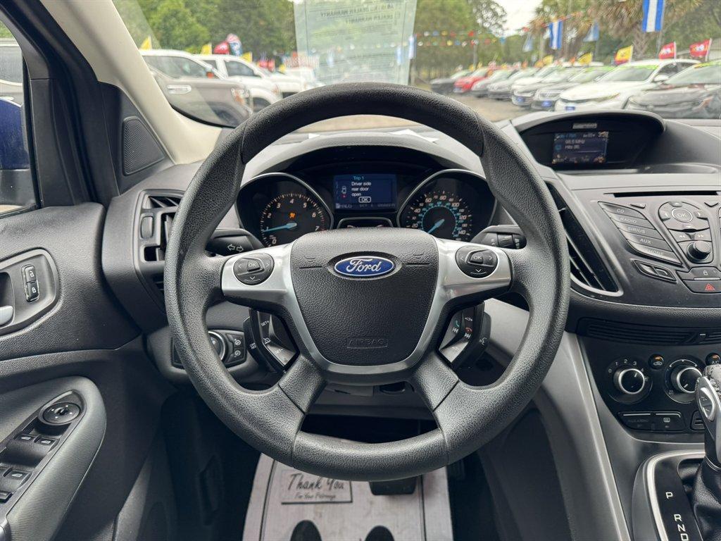 2013 Blue /Black Ford Escape (1FMCU0G97DU) with an 2.0l I-4 DI T/C Ecoboost engine, Automatic transmission, located at 745 East Steele Rd., West Columbia, SC, 29170, (803) 755-9148, 33.927212, -81.148483 - Photo#7