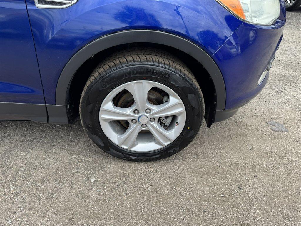 2013 Blue /Black Ford Escape (1FMCU0G97DU) with an 2.0l I-4 DI T/C Ecoboost engine, Automatic transmission, located at 745 East Steele Rd., West Columbia, SC, 29170, (803) 755-9148, 33.927212, -81.148483 - Photo#26