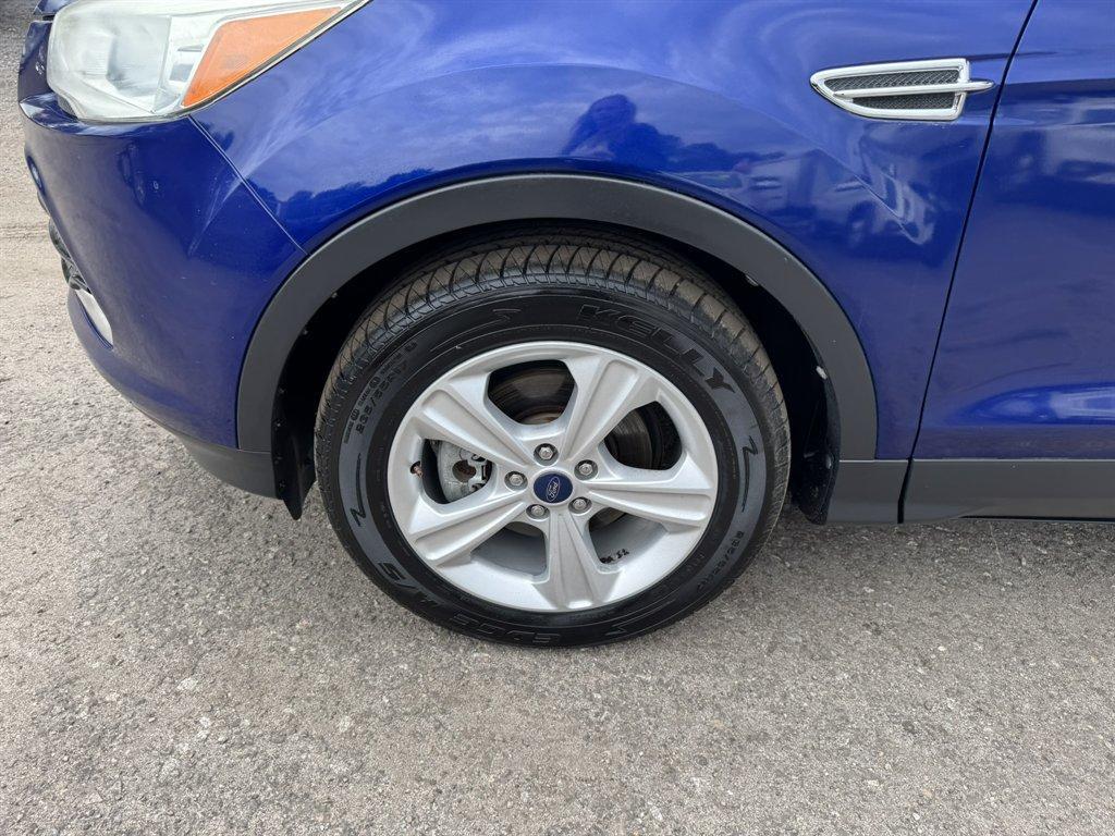 2013 Blue /Black Ford Escape (1FMCU0G97DU) with an 2.0l I-4 DI T/C Ecoboost engine, Automatic transmission, located at 745 East Steele Rd., West Columbia, SC, 29170, (803) 755-9148, 33.927212, -81.148483 - Photo#29