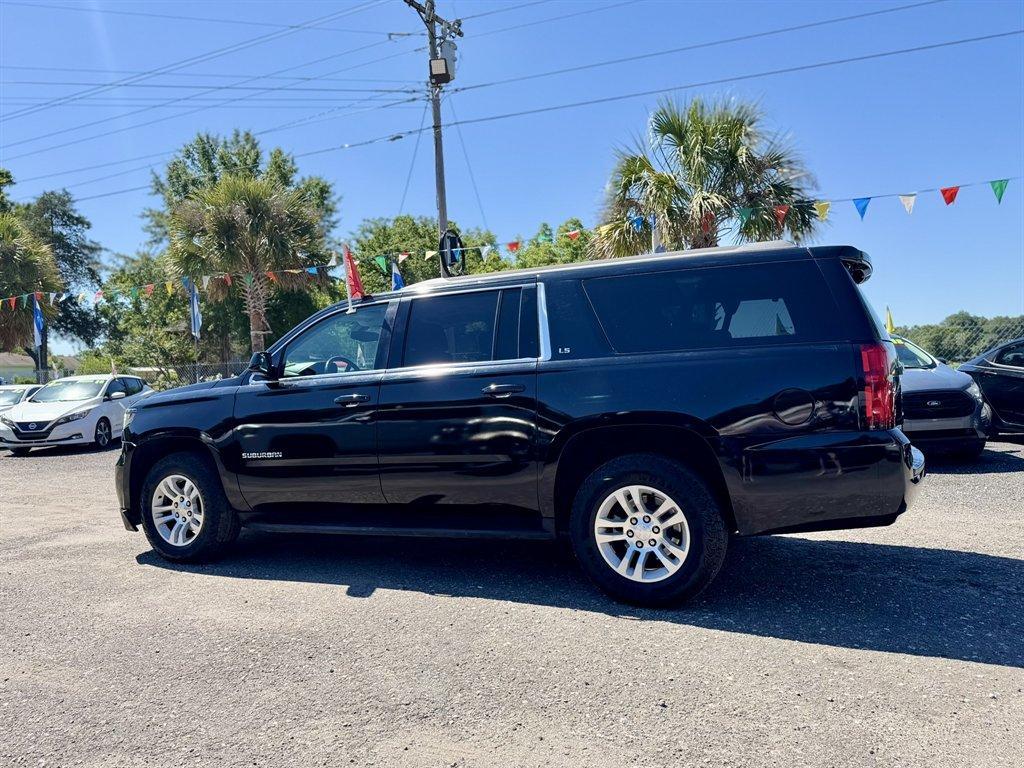 2015 Black /Black Chevrolet Suburban (1GNSKHKCXFR) with an 5.3l V8 DI VVT Flex 5.3l engine, Automatic transmission, located at 745 East Steele Rd., West Columbia, SC, 29170, (803) 755-9148, 33.927212, -81.148483 - Photo#5