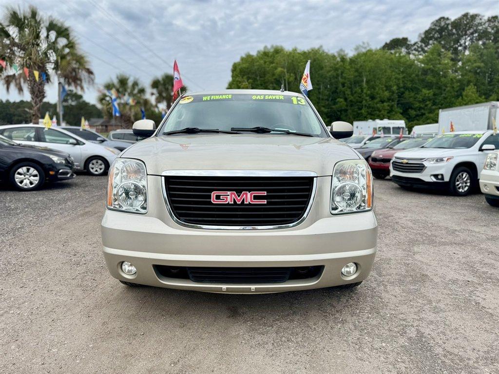 2013 Gold /Black GMC Yukon (1GKS1CE06DR) with an 5.3l V8 SFI Flex 5.3l engine, Automatic transmission, located at 745 East Steele Rd., West Columbia, SC, 29170, (803) 755-9148, 33.927212, -81.148483 - Photo#1