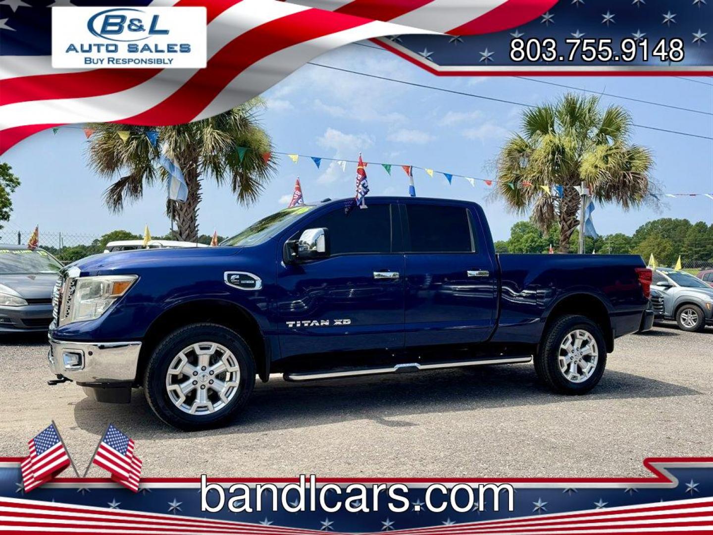 2016 Blue /Black Nissan Titan XD (1N6BA1F23GN) with an 5.0l V8 DI Dohc Tdsl 5.0l engine, Automatic transmission, located at 745 East Steele Rd., West Columbia, SC, 29170, (803) 755-9148, 33.927212, -81.148483- Photo#0