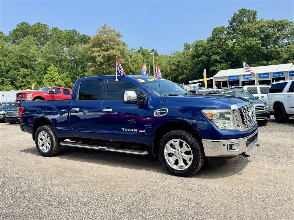 2016 Blue /Black Nissan Titan XD (1N6BA1F23GN) with an 5.0l V8 DI Dohc Tdsl 5.0l engine, Automatic transmission, located at 745 East Steele Rd., West Columbia, SC, 29170, (803) 755-9148, 33.927212, -81.148483- Photo#2