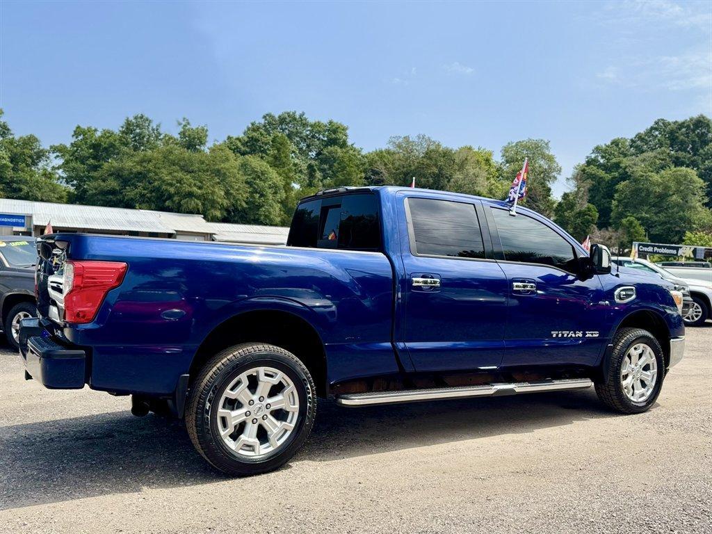 2016 Blue /Black Nissan Titan XD (1N6BA1F23GN) with an 5.0l V8 DI Dohc Tdsl 5.0l engine, Automatic transmission, located at 745 East Steele Rd., West Columbia, SC, 29170, (803) 755-9148, 33.927212, -81.148483- Photo#3
