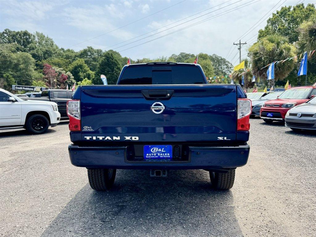 2016 Blue /Black Nissan Titan XD (1N6BA1F23GN) with an 5.0l V8 DI Dohc Tdsl 5.0l engine, Automatic transmission, located at 745 East Steele Rd., West Columbia, SC, 29170, (803) 755-9148, 33.927212, -81.148483- Photo#4