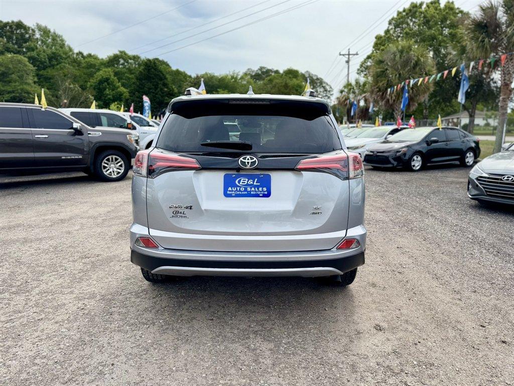 2018 Silver /Black Toyota RAV4 (JTMJFREV8JJ) with an 2.5l I-4 DI Dohc 2.5l engine, Automatic transmission, located at 745 East Steele Rd., West Columbia, SC, 29170, (803) 755-9148, 33.927212, -81.148483 - Photo#4