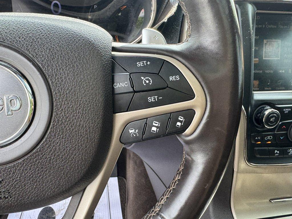 2014 Brown /Brown Jeep Grand Cherokee (1C4RJFJT4EC) with an 5.7l V8 MPI Hemi 5.7l engine, Automatic transmission, located at 745 East Steele Rd., West Columbia, SC, 29170, (803) 755-9148, 33.927212, -81.148483 - Photo#9