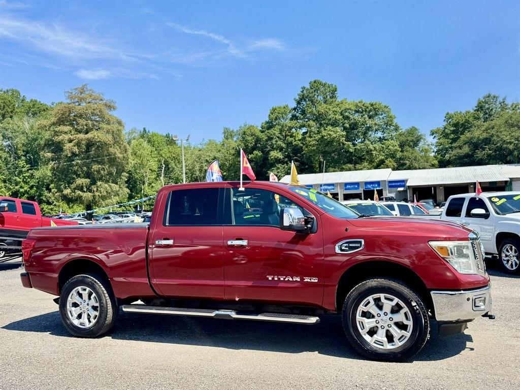 2016 Red /Black Nissan Titan XD (1N6BA1F24GN) with an 5.0l V8 DI Dohc Tdsl 5.0l engine, Automatic transmission, located at 745 East Steele Rd., West Columbia, SC, 29170, (803) 755-9148, 33.927212, -81.148483- Photo#2