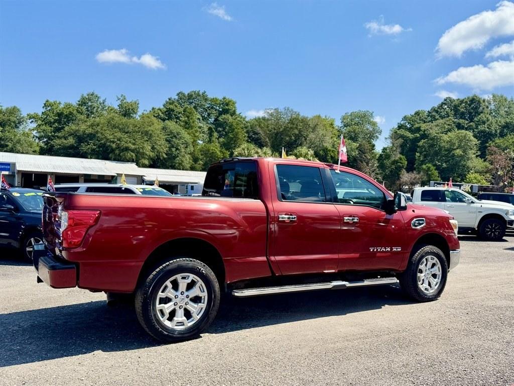 2016 Red /Black Nissan Titan XD (1N6BA1F24GN) with an 5.0l V8 DI Dohc Tdsl 5.0l engine, Automatic transmission, located at 745 East Steele Rd., West Columbia, SC, 29170, (803) 755-9148, 33.927212, -81.148483- Photo#3
