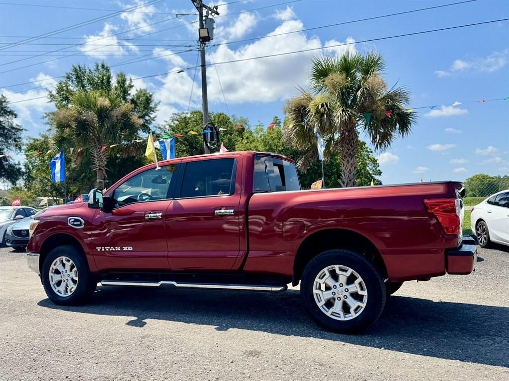 2016 Red /Black Nissan Titan XD (1N6BA1F24GN) with an 5.0l V8 DI Dohc Tdsl 5.0l engine, Automatic transmission, located at 745 East Steele Rd., West Columbia, SC, 29170, (803) 755-9148, 33.927212, -81.148483- Photo#5