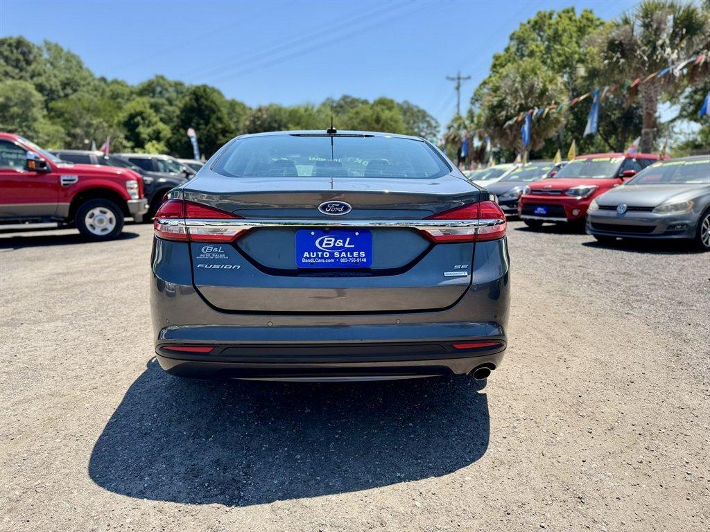 2017 Grey /Black Ford Fusion (3FA6P0HDXHR) with an 1.5l I-4 DI Dohc Ecoboost engine, Automatic transmission, located at 745 East Steele Rd., West Columbia, SC, 29170, (803) 755-9148, 33.927212, -81.148483 - Photo#4