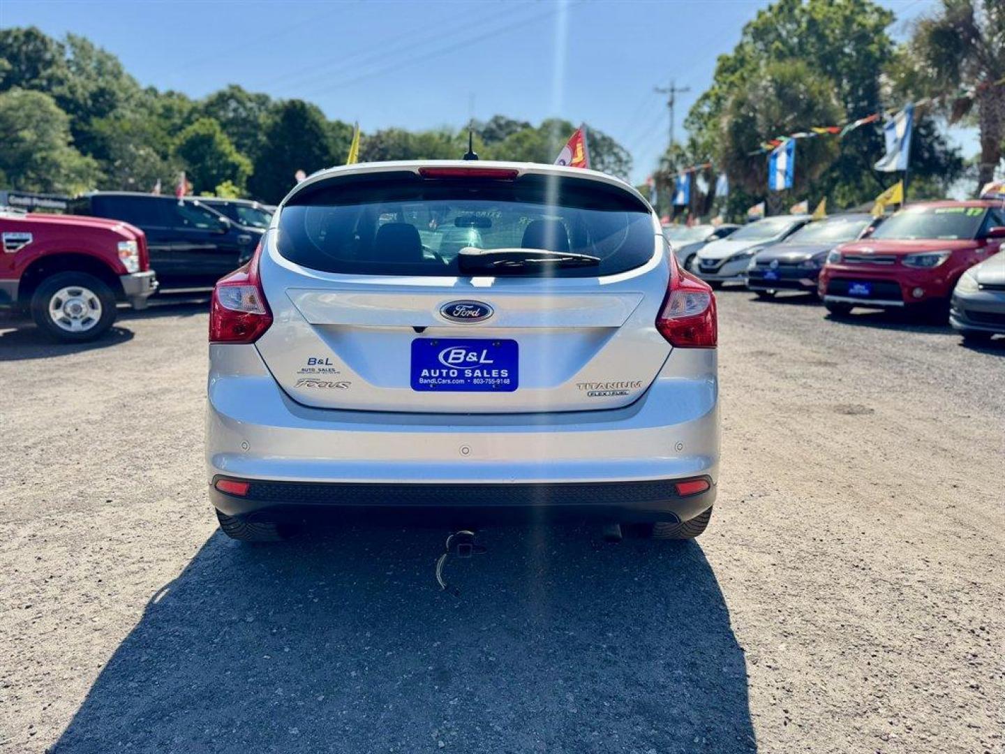 2013 Silver /Black Ford Focus (1FADP3N23DL) with an 2.0l I-4 DI TI-VCT 2.0l engine, Automatic transmission, located at 745 East Steele Rd., West Columbia, SC, 29170, (803) 755-9148, 33.927212, -81.148483 - Photo#4
