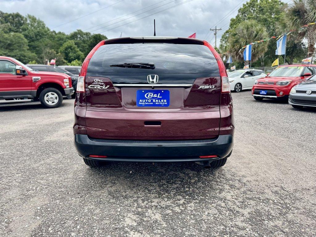 2014 Red /Grey Honda CR-V (5J6RM4H52EL) with an 2.4l I-4 MPI Dohc 2.4l engine, Automatic transmission, located at 745 East Steele Rd., West Columbia, SC, 29170, (803) 755-9148, 33.927212, -81.148483 - Photo#4