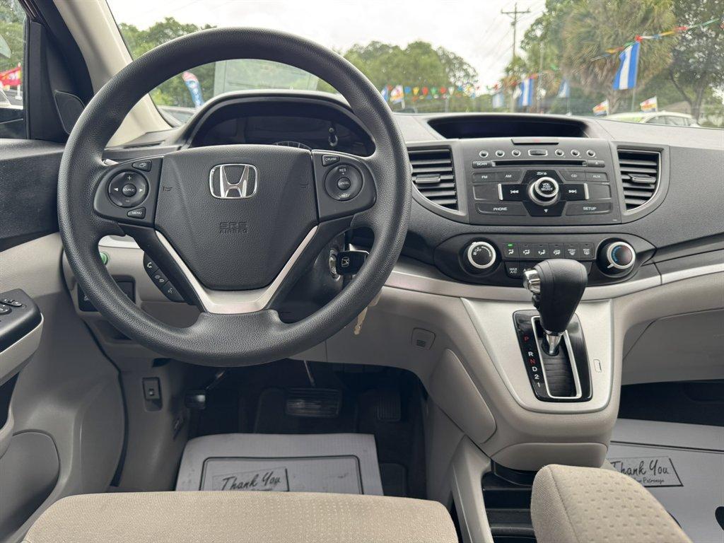 2014 Red /Grey Honda CR-V (5J6RM4H52EL) with an 2.4l I-4 MPI Dohc 2.4l engine, Automatic transmission, located at 745 East Steele Rd., West Columbia, SC, 29170, (803) 755-9148, 33.927212, -81.148483 - Photo#6