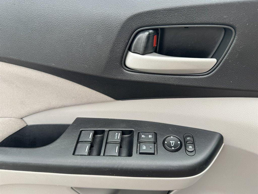 2014 Red /Grey Honda CR-V (5J6RM4H52EL) with an 2.4l I-4 MPI Dohc 2.4l engine, Automatic transmission, located at 745 East Steele Rd., West Columbia, SC, 29170, (803) 755-9148, 33.927212, -81.148483 - Photo#19