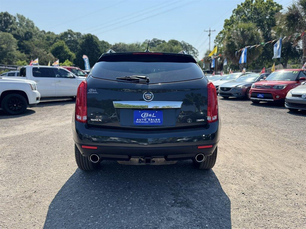 2016 Grey /Taupe Cadillac SRX (3GYFNBE38GS) with an 3.6l V6 Sidi Dohc 3.6l engine, Automatic transmission, located at 745 East Steele Rd., West Columbia, SC, 29170, (803) 755-9148, 33.927212, -81.148483 - Photo#4