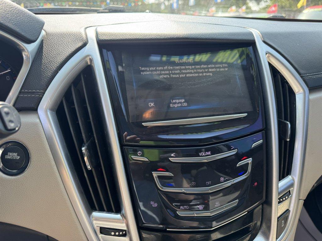 2016 Grey /Taupe Cadillac SRX (3GYFNBE38GS) with an 3.6l V6 Sidi Dohc 3.6l engine, Automatic transmission, located at 745 East Steele Rd., West Columbia, SC, 29170, (803) 755-9148, 33.927212, -81.148483 - Photo#12