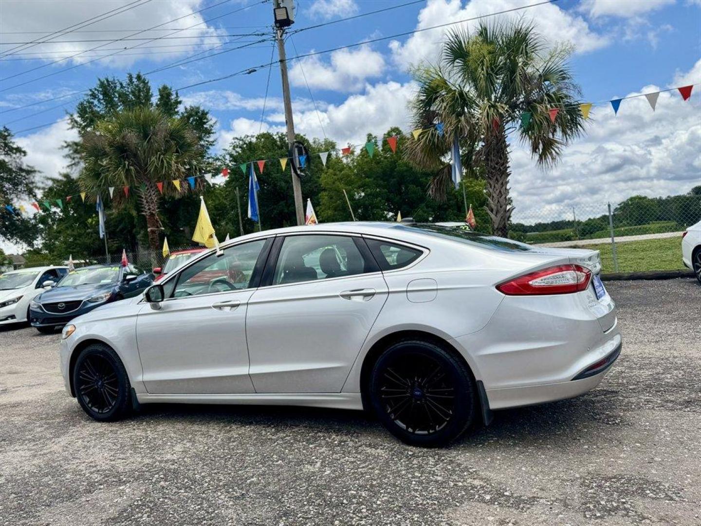 2014 Silver /Black Ford Fusion (3FA6P0HR8ER) with an 1.6l I-4 DI Dohc TC Ecobt engine, Manual transmission, located at 745 East Steele Rd., West Columbia, SC, 29170, (803) 755-9148, 33.927212, -81.148483- Photo#5