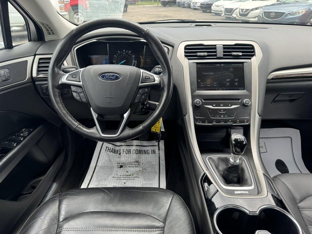 2014 Silver /Black Ford Fusion (3FA6P0HR8ER) with an 1.6l I-4 DI Dohc TC Ecobt engine, Manual transmission, located at 745 East Steele Rd., West Columbia, SC, 29170, (803) 755-9148, 33.927212, -81.148483 - Photo#6