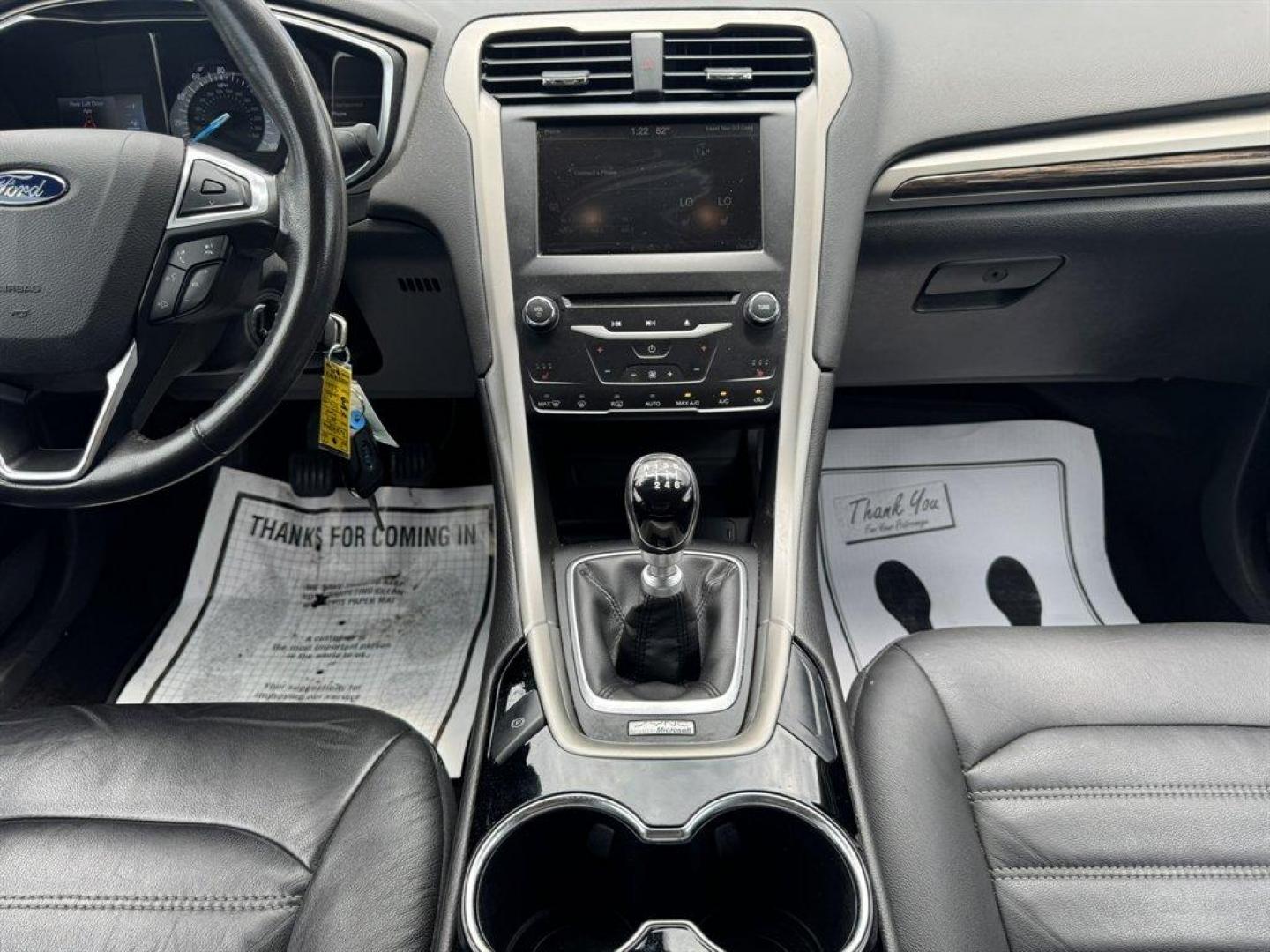 2014 Silver /Black Ford Fusion (3FA6P0HR8ER) with an 1.6l I-4 DI Dohc TC Ecobt engine, Manual transmission, located at 745 East Steele Rd., West Columbia, SC, 29170, (803) 755-9148, 33.927212, -81.148483- Photo#11