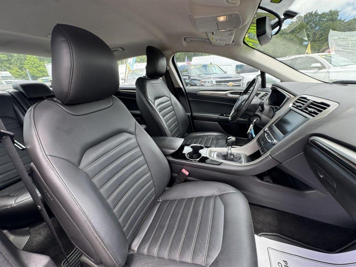 2014 Silver /Black Ford Fusion (3FA6P0HR8ER) with an 1.6l I-4 DI Dohc TC Ecobt engine, Manual transmission, located at 745 East Steele Rd., West Columbia, SC, 29170, (803) 755-9148, 33.927212, -81.148483- Photo#24