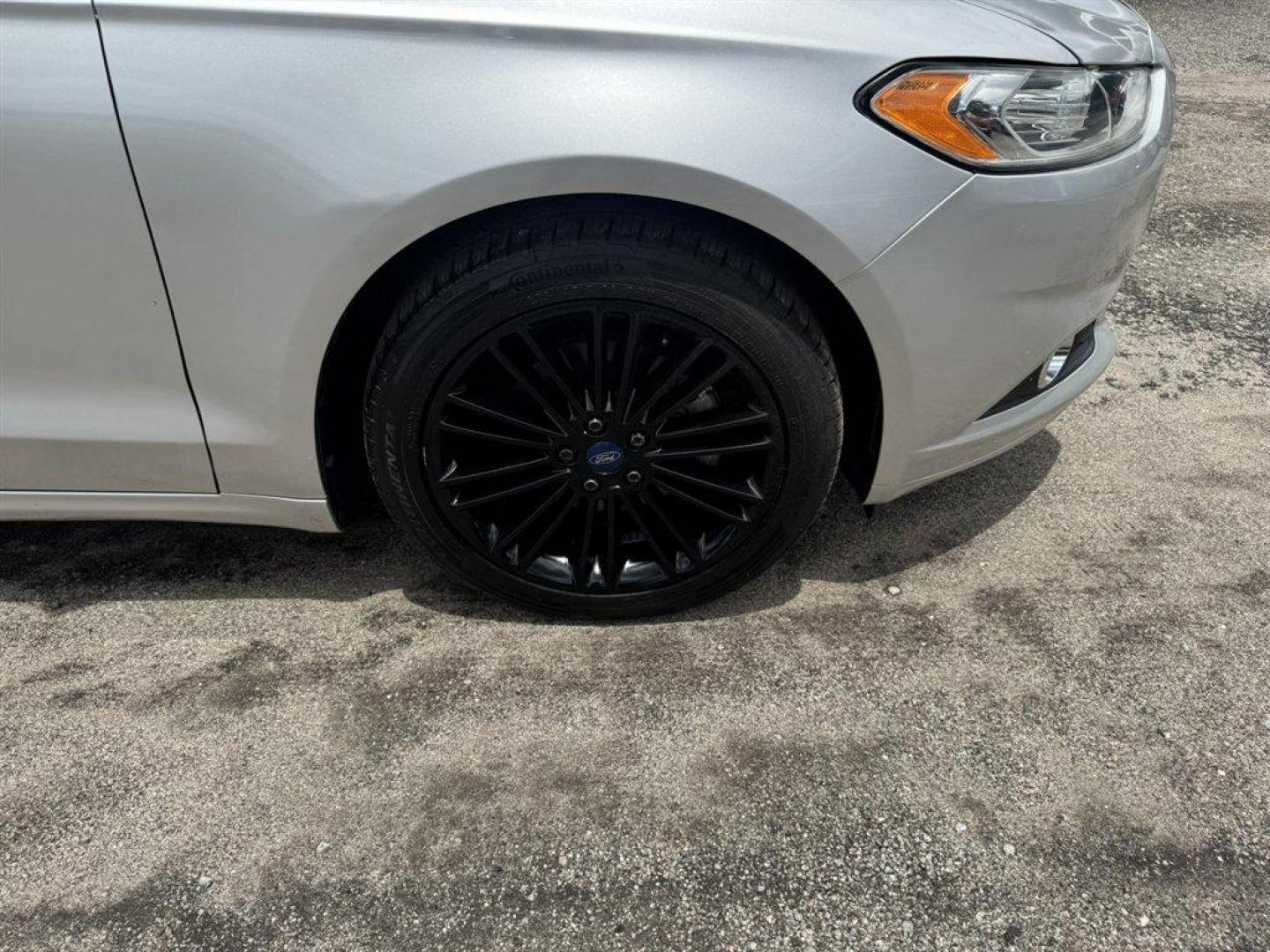 2014 Silver /Black Ford Fusion (3FA6P0HR8ER) with an 1.6l I-4 DI Dohc TC Ecobt engine, Manual transmission, located at 745 East Steele Rd., West Columbia, SC, 29170, (803) 755-9148, 33.927212, -81.148483- Photo#27