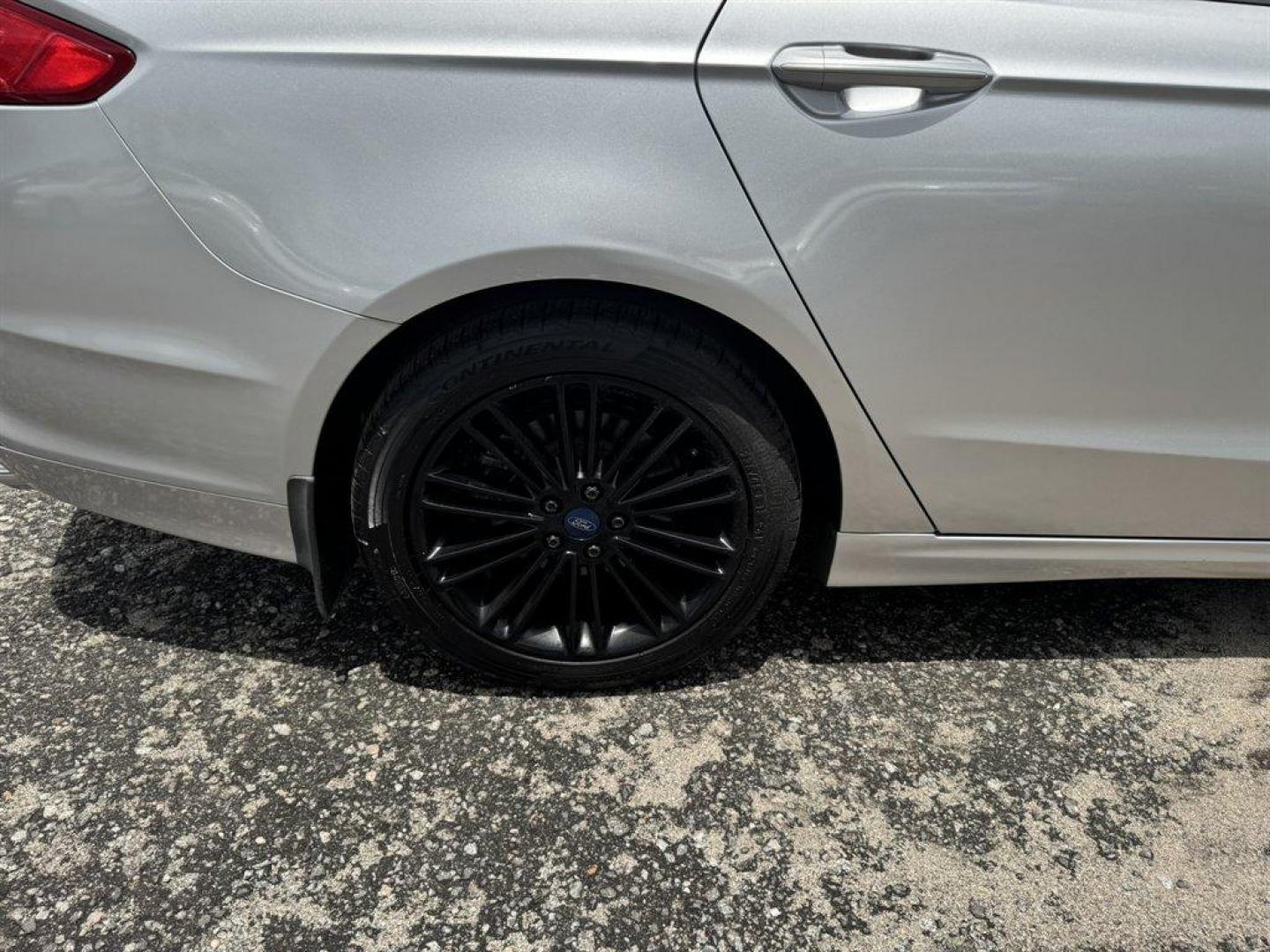 2014 Silver /Black Ford Fusion (3FA6P0HR8ER) with an 1.6l I-4 DI Dohc TC Ecobt engine, Manual transmission, located at 745 East Steele Rd., West Columbia, SC, 29170, (803) 755-9148, 33.927212, -81.148483- Photo#28