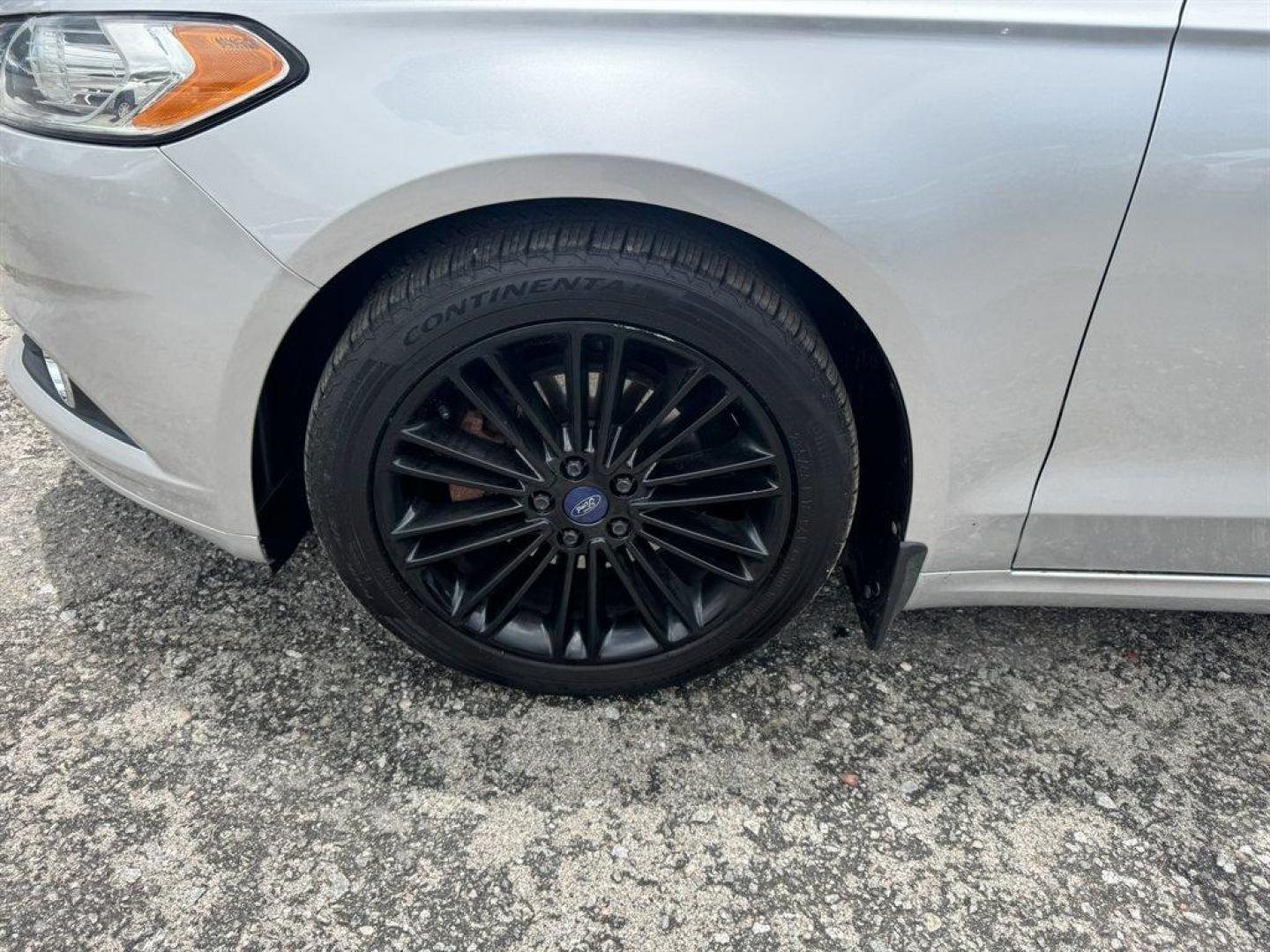 2014 Silver /Black Ford Fusion (3FA6P0HR8ER) with an 1.6l I-4 DI Dohc TC Ecobt engine, Manual transmission, located at 745 East Steele Rd., West Columbia, SC, 29170, (803) 755-9148, 33.927212, -81.148483- Photo#30